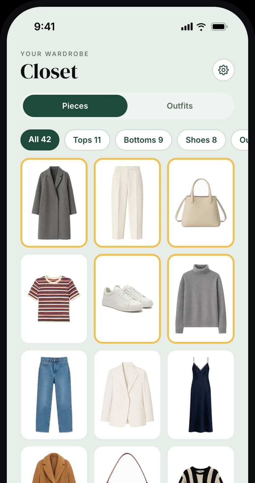 Attiri's digital wardrobe on iPhone: a closet grid of coats, knits, jeans, shoes and bags