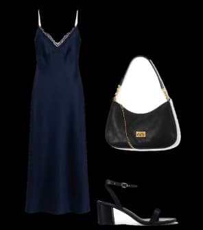 Flat lay of a navy slip dress, a black shoulder bag and black heeled sandals